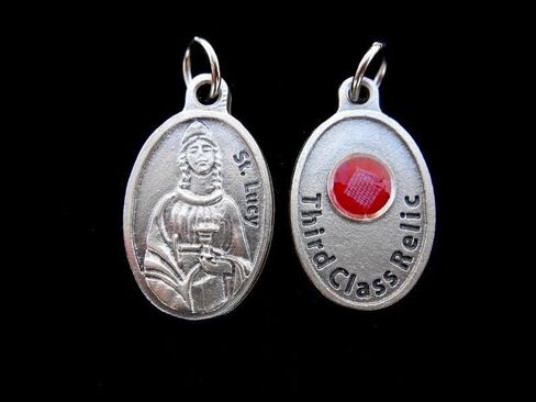 THIRD CLASS RELIC MEDAL ST LUCY MADE IN ITALY PIECE OF CLOTH THAT TOUCHED HER 1rst CLASS RELICS in Saudi Arabia