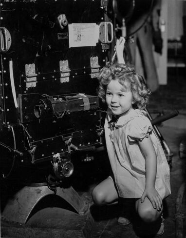 Shirley Temple Squatting in Dress Photo Print (8 x 10) in Saudi Arabia