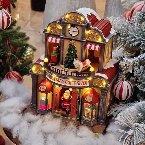 12" Animated Christmas Village House with LED Lights & Music - Spinning Train, Dynamically Moving Santa, Handpainted Resin Shop for Indoor Home Tabletop Decor in Saudi Arabia