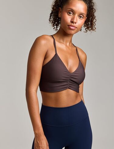 Women's Flow Scrunch Sports Bra V Neck Padded Yoga Tank Adjustable Straps Cross Back Crop Tops in Saudi Arabia