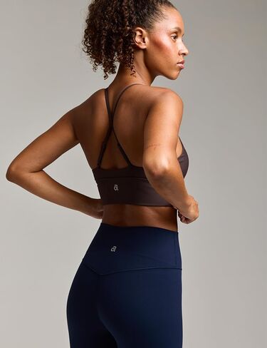 Women's Flow Scrunch Sports Bra V Neck Padded Yoga Tank Adjustable Straps Cross Back Crop Tops in Saudi Arabia