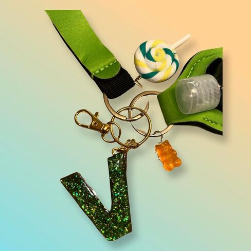 Aldi4u Empty Travel Bottles with Keychain Holder Set Include Portable Refillable with keychain alphabet later V epoxy resins green color with two charms 10" inches tall (Green, Epoxy resin) in Saudi Arabia