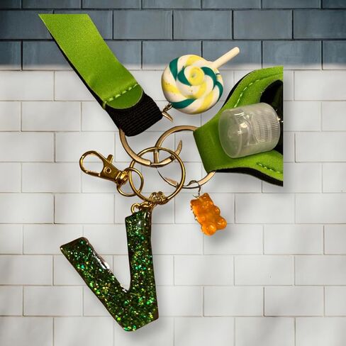Aldi4u Empty Travel Bottles with Keychain Holder Set Include Portable Refillable with keychain alphabet later V epoxy resins green color with two charms 10" inches tall (Green, Epoxy resin) in Saudi Arabia