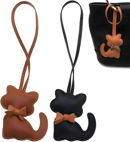 Cat-Shaped Bag Charms Keychains - Set of 2, PU Leather, Cartoon Kitten Designs, Stylish Women's Accessories in Saudi Arabia