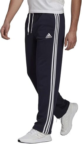 سروال رجالي من Adidas Essentials مصنوع من الصوف بحاشية مفتوحة بثلاثة خطوط in Kuwait