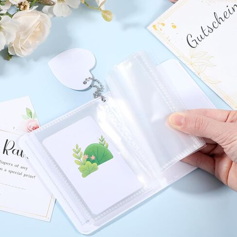 Xindojuz 4x3 Inch Photocard Holder Book, Mini Photo Album Mirror-Like Photocard Binder, Small Photo Card Book Love Heart Hollow Photos Card ID Holder with Pendant for Collection, 32 Pockets(White) in Saudi Arabia