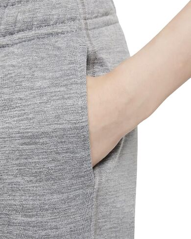 بنطال تدريب مدبب برسومات جرافيك للأطفال الكبار (للأولاد) من Nike Therma-FIT (صغير، رمادي دخاني/هيذر) in Saudi Arabia