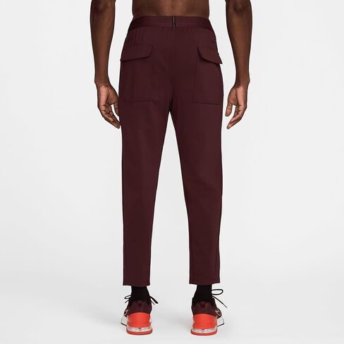 نايكي ايه بي اس. بنطال Dri-FIT ADV Stealth متعدد الاستخدامات للرجال (FN3020-652، عنابي كراش/أسود/أسود) مقاس متوسط in Kuwait