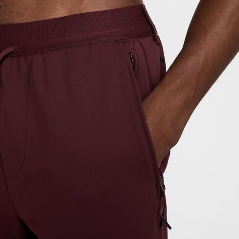 نايكي ايه بي اس. بنطال Dri-FIT ADV Stealth متعدد الاستخدامات للرجال (FN3020-652، عنابي كراش/أسود/أسود) مقاس متوسط in Kuwait