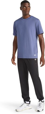 بنطال Slam Dunk Cinch للرجال من Reebok، مقاس قياسي، درزة داخلية 31 بوصة، نسيج بولي جيرسي مطاطي خفيف الوزن in Kuwait