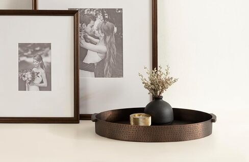 Kate and Laurel Samana Modern Oval Metal Tray, 16 x 10, Brass, Polished Decorative Serving Tray with Hammered Surface for Use as Ottoman Tray or Entryway Decor in Saudi Arabia