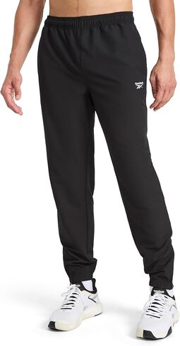 Reebok Men's Repeat Woven Pant, Standard Fit, 30" Inseam, Lightweight Stretch Poly-Blend Fabric in Saudi Arabia