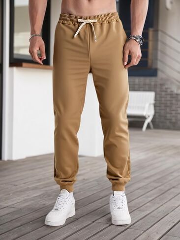 Men's Athletic Sweatpants Drawstring Elastic Waisted with Pockets Casual Joggers Trousers in Saudi Arabia