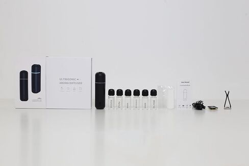 Car Mini Diffuser – Luxury Waterless Car Scent System with Motion Sensor | Includes 6 Premium Scents (White) in Saudi Arabia
