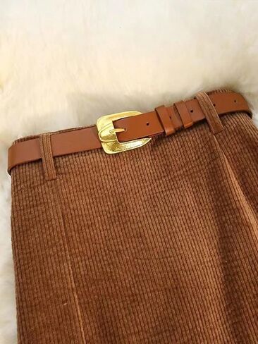 A Brown Corduroy Skirt for Women, with a high Waist and a Side-Slit Belt, is Elegant and Fashionable in Saudi Arabia