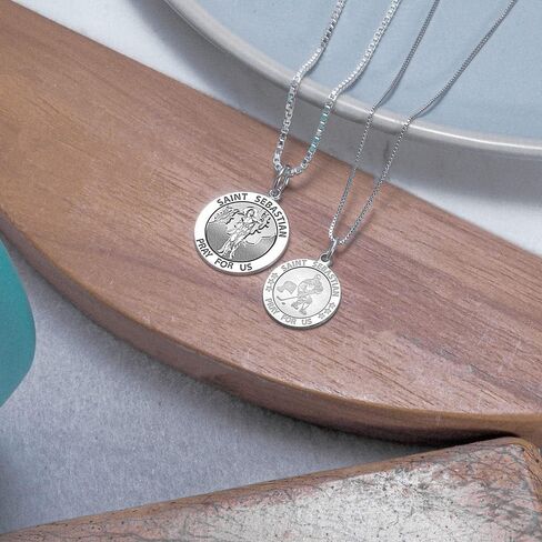 PicturesOnGold.com Hockey - Saint Sebastian Doubledside Sports Religious Medal - 2/3 Inch Size of Dime, Sterling Silver in Saudi Arabia