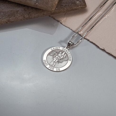PicturesOnGold.com Hockey - Saint Sebastian Doubledside Sports Religious Medal - 2/3 Inch Size of Dime, Sterling Silver in Saudi Arabia