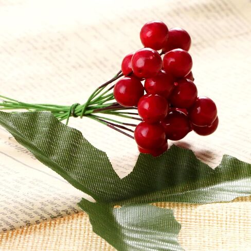 50 Pack Artificial Red Berry Stems and 50 Pack Green Leaves, Christmas Holly Berry Branches for Party Holiday Home Decoration and DIY Garland and Wreath Ornaments in Saudi Arabia