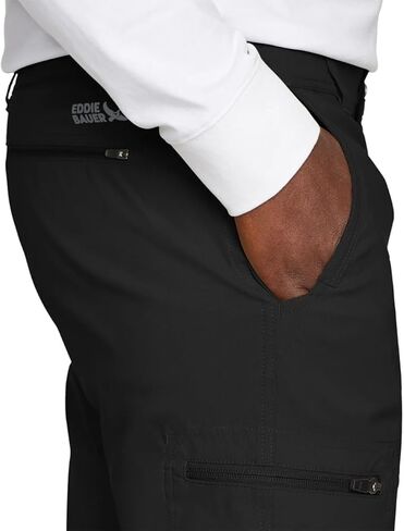 بنطال Eddie Bauer للرجال مبطن بالصوف - مقاوم للماء، نسيج مطاطي خفيف الوزن، جيوب بسحاب (أسود، 34Wx32L) in Saudi Arabia