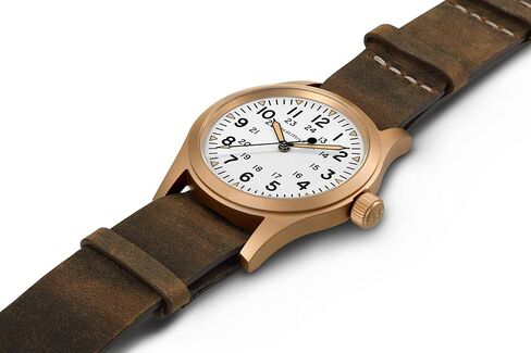 ساعة هاميلتون كاكي فيلد ميكانيكية للرجال، هيكل برونزي وتيتانيوم 38 ملم، صناعة سويسرية، ساعة يد تناظرية بمينا أبيض للرجال، مقاومة للماء حتى 50 متر، كريستال ياقوتي، حزام من جلد العجل in Kuwait