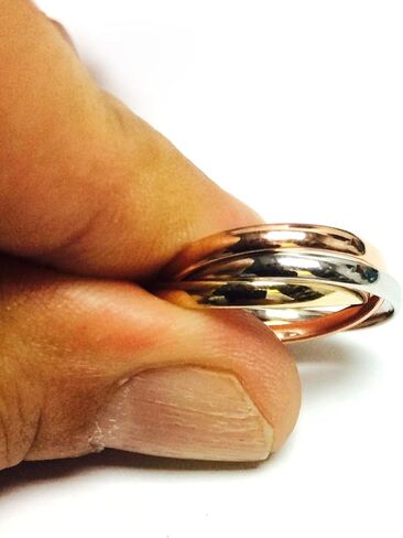 Jewelry Affairs 14K Gold Trinity Tri-Color Hollow Rolling Ring in Saudi Arabia