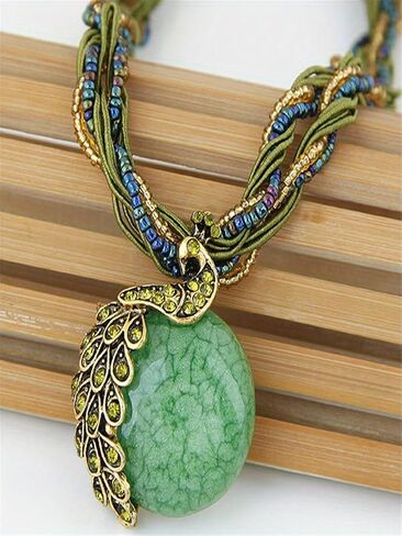 Exquisite Bohemian Chic Peacock Gemstone Pendant Necklace - Retro Leaf Design, Ethnic Style Jewelry for Women, Adjustable Chain in Saudi Arabia
