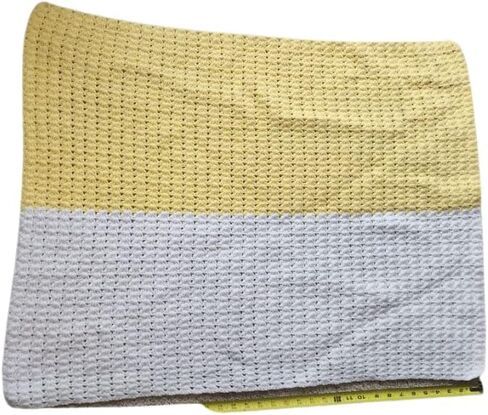 Yellow and white baby blanket in Saudi Arabia