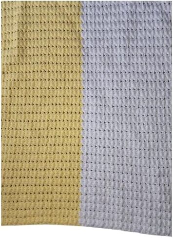 Yellow and white baby blanket in Saudi Arabia