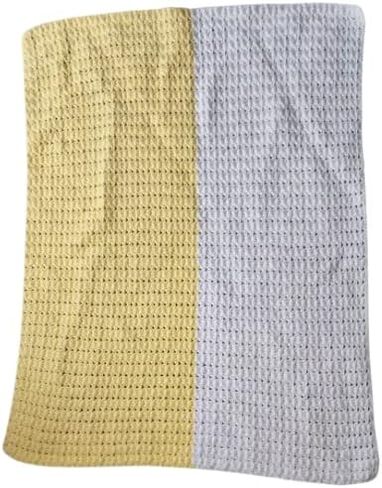 Yellow and white baby blanket in Saudi Arabia
