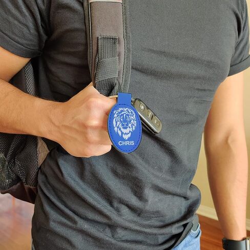 سلسلة مفاتيح بيضاوية LaserGram، بيانو كبير، نقش شخصي متضمن (أزرق داكن) in Kuwait