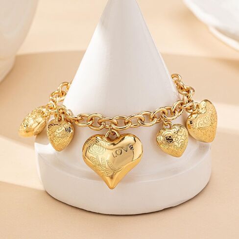 Chunky Heart Charm Bracelet For Women Vintage Style Fashion Jewelry Gold Tone Link Chain Design Featuring Multiple Puffy Heart Pendants Engraved Floral Hearts Elegant Statement Wrist Accessory Gift Ready Retro Romantic Aesthetic in Saudi Arabia