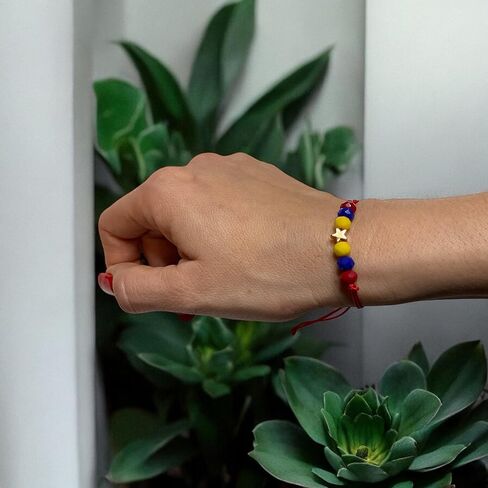 Red Venezuela bracelet in Saudi Arabia