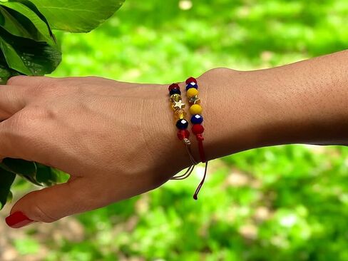 Red Venezuela bracelet in Saudi Arabia