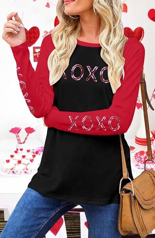 قمصان عيد الحب للنساء تي شيرت مطبوع عليه حروف الحب تي شيرت مضحك بالترتر لعيد الحب XOXO بأكمام طويلة كاجوال in Saudi Arabia