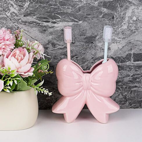 مزهرية سيراميك على شكل فيونكة وردية - مزهرية على شكل فيونكة للزهور، حامل فرشاة المكياج، منظم القلم وفرشاة الأسنان، منزل من السيراميك الوردي، مكتب، هدية ديكور مكتب الحمام in Kuwait