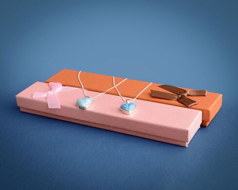 Handmade necklace with a beautiful 925 silver pendant and a natural blue stone in the shape of a heart, crafted artisanally. in Saudi Arabia