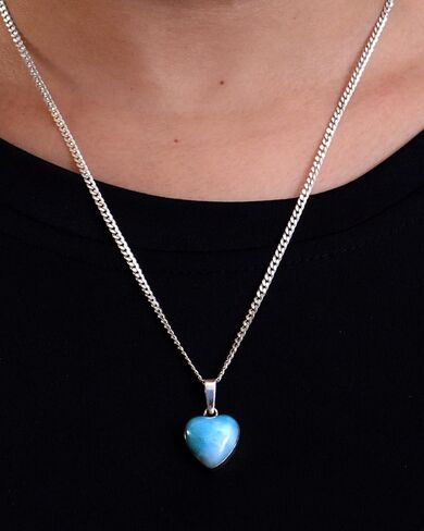 Handmade necklace with a beautiful 925 silver pendant and a natural blue stone in the shape of a heart, crafted artisanally. in Saudi Arabia