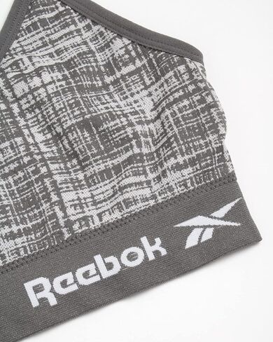 Reebok Womens Sports Bras - 2 Pack Soft Stretch Seamless Everyday Bras for Women Cross Back Strap Performance Sports Bra in Saudi Arabia