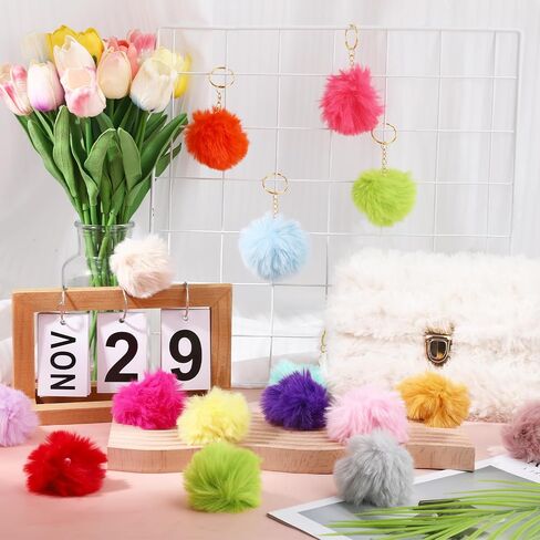 YoehMongYo 50 قطعة من سلاسل المفاتيح الملونة بوم بومس، سلسلة مفاتيح على شكل كرة من فراء الأرنب الصناعي للفتيات والنساء حقيبة قلادة إكسسوارات in Kuwait