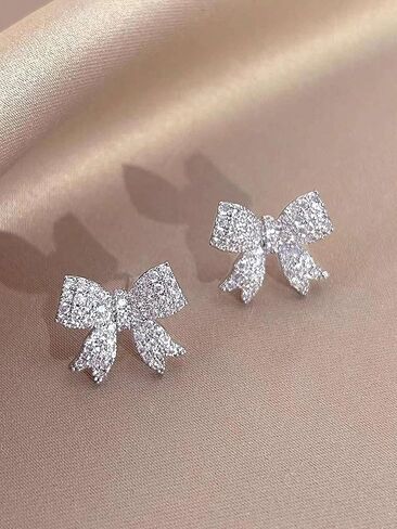 Sparkling Crystal Bow Earrings - Delicate Rhinestone Studded Bow Tie Drop Earrings in Saudi Arabia
