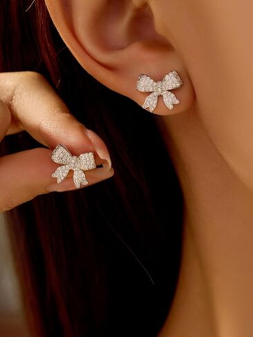 Sparkling Crystal Bow Earrings - Delicate Rhinestone Studded Bow Tie Drop Earrings in Saudi Arabia