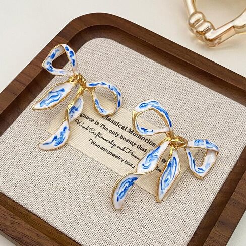 Enamel Bow Earrings for Women – 18K Gold Plated Blue and White Porcelain Jewelry, Elegant Ribbon Stud Earrings Gift for Birthday, Anniversary, or Wedding in Saudi Arabia