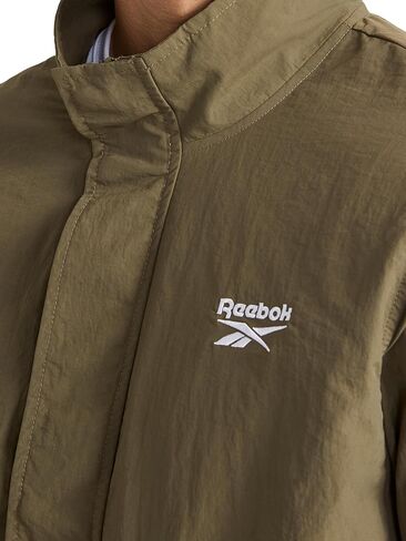 سترة Ri Utility المنسوجة للرجال من Reebok، مقاس قياسي، نسيج نايلون خفيف الوزن in Kuwait