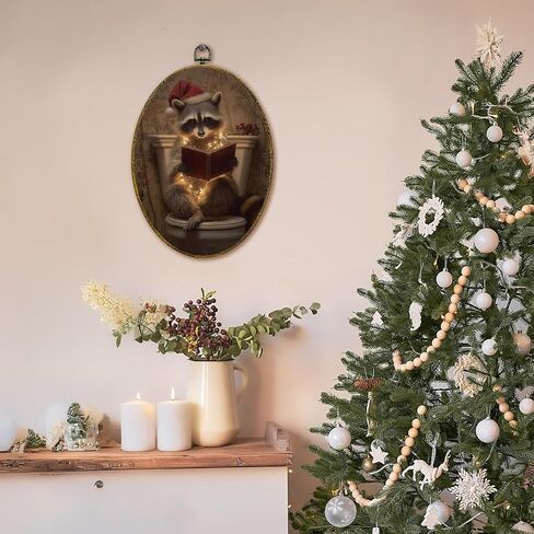 XFCICRLJ Funny Christmas Raccoon Bathroom Wall Art Decor, Christmas Racoon Reading Book Oval Canvas Prints Framed, Xmas Trash Panda Wall Art Decorations for Toilet Restroom Washroom Decor, 11x8.5 Inch 004-MH-TYH in Saudi Arabia