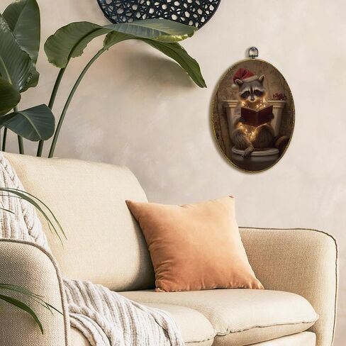 XFCICRLJ Funny Christmas Raccoon Bathroom Wall Art Decor, Christmas Racoon Reading Book Oval Canvas Prints Framed, Xmas Trash Panda Wall Art Decorations for Toilet Restroom Washroom Decor, 11x8.5 Inch 004-MH-TYH in Saudi Arabia