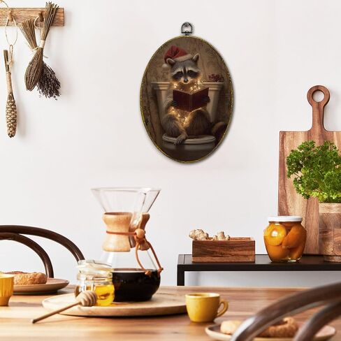 XFCICRLJ Funny Christmas Raccoon Bathroom Wall Art Decor, Christmas Racoon Reading Book Oval Canvas Prints Framed, Xmas Trash Panda Wall Art Decorations for Toilet Restroom Washroom Decor, 11x8.5 Inch 004-MH-TYH in Saudi Arabia