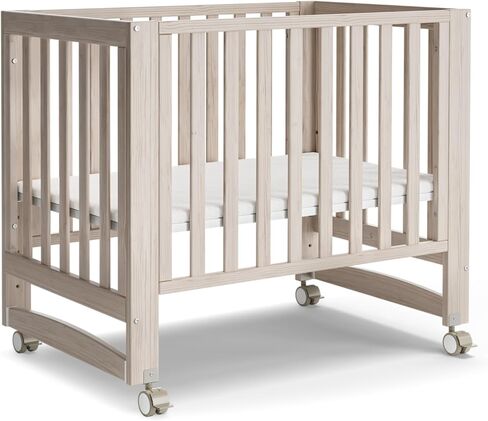 MAMAZING EvoNest 6-in-1 Convertible Baby Mini Crib with Wheels | GREENGUARD Gold Certified, New Zealand Pine Wood, 4 Adjustable Heights, Rocking Mode, Small Spaces Design, Washed Natural in Saudi Arabia