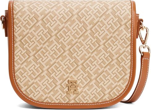 Tommy Hilfiger womens Monogram Leather Saddle Crossbody Bag With Adjustable Crossbody Strap in Saudi Arabia