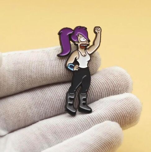 Futurama Leela Shakes Shaking Fist Raised Pump Animated Comedy TV Show 1.7" Enamel Pin Badge in Saudi Arabia