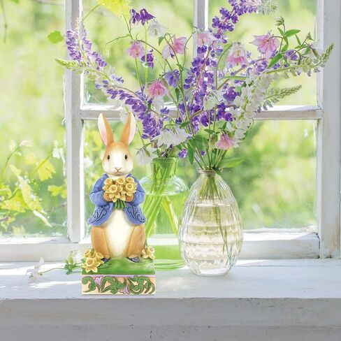 Enesco Beatrix Potter by Jim Shore Peter Rabbit Holding Daffodil Flowers Figurine, 6.22 Inch, Multicolor in Saudi Arabia